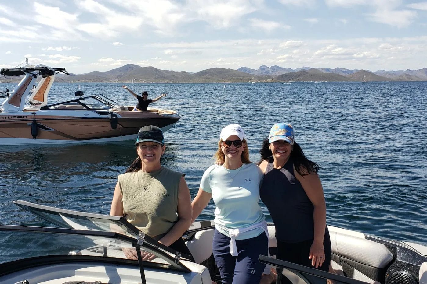 Friends inside boat smiling