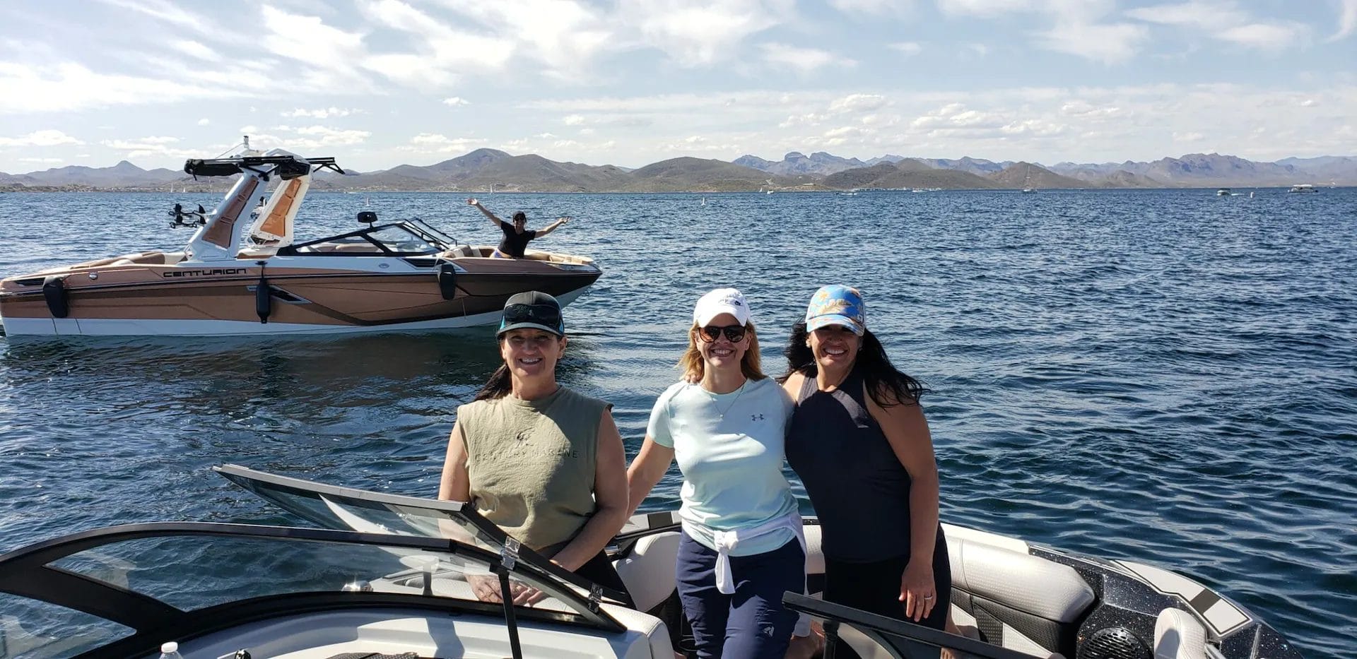 Friends inside boat smiling