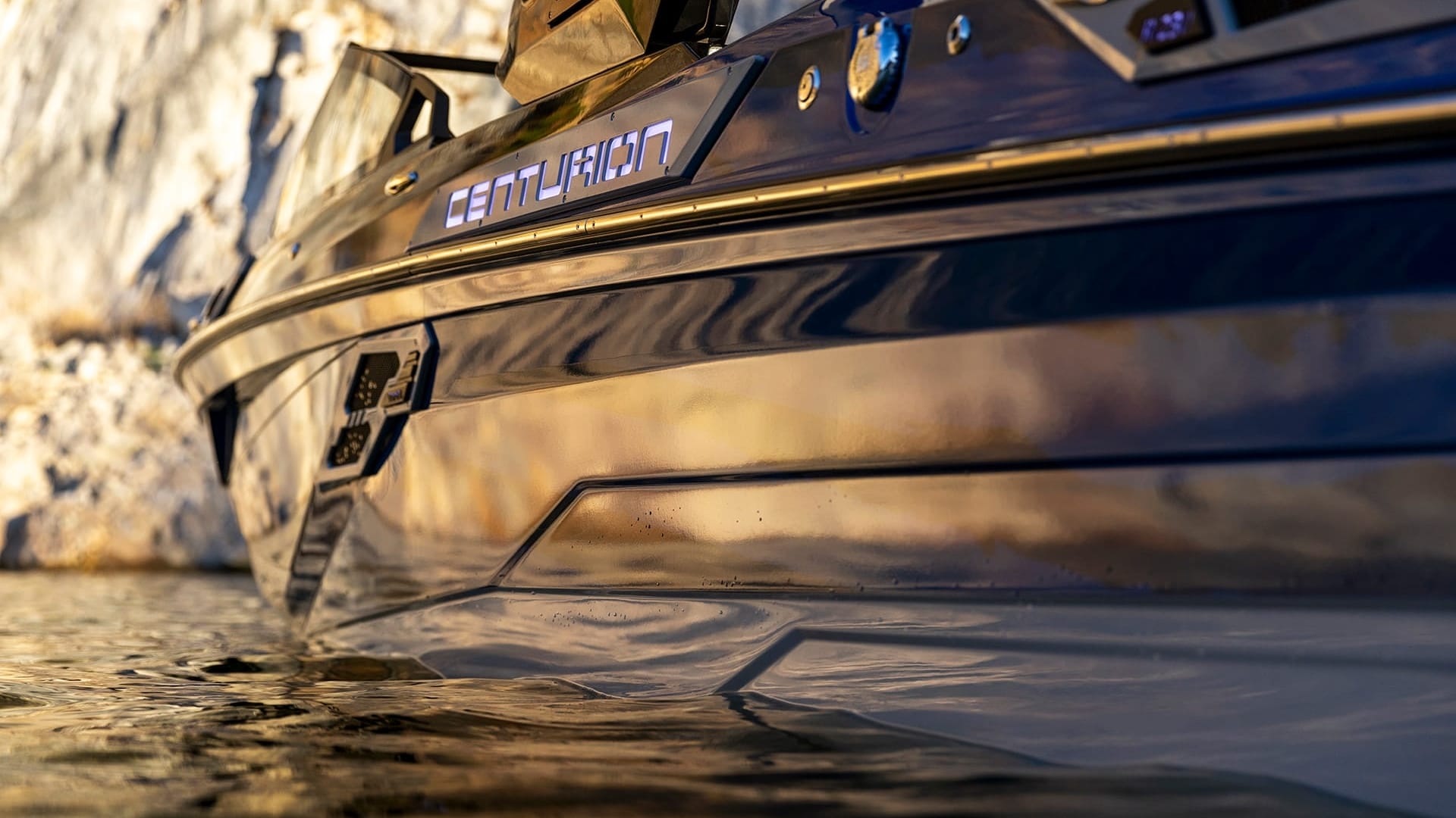 Close-up of a sleek, shiny boat labeled 