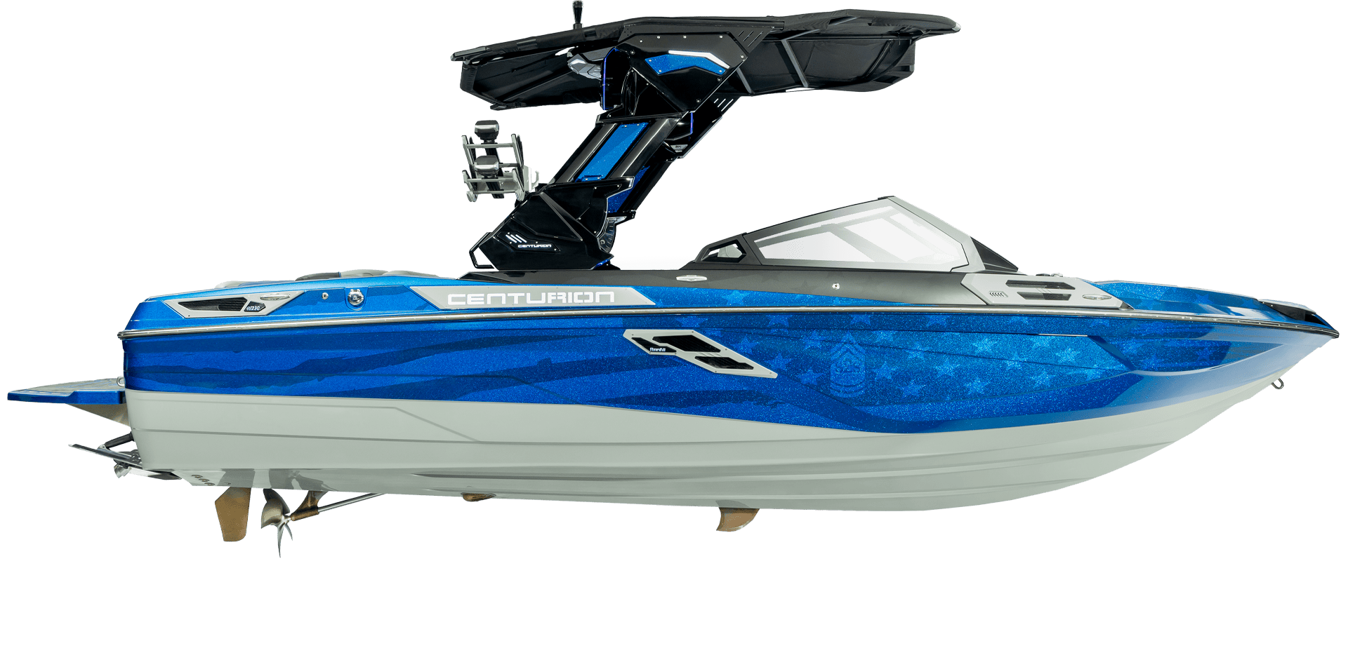 The Centurion Ri230 wakeboard boat boasts a sleek blue and gray design, featuring a stylish wake tower that turns heads on the water.