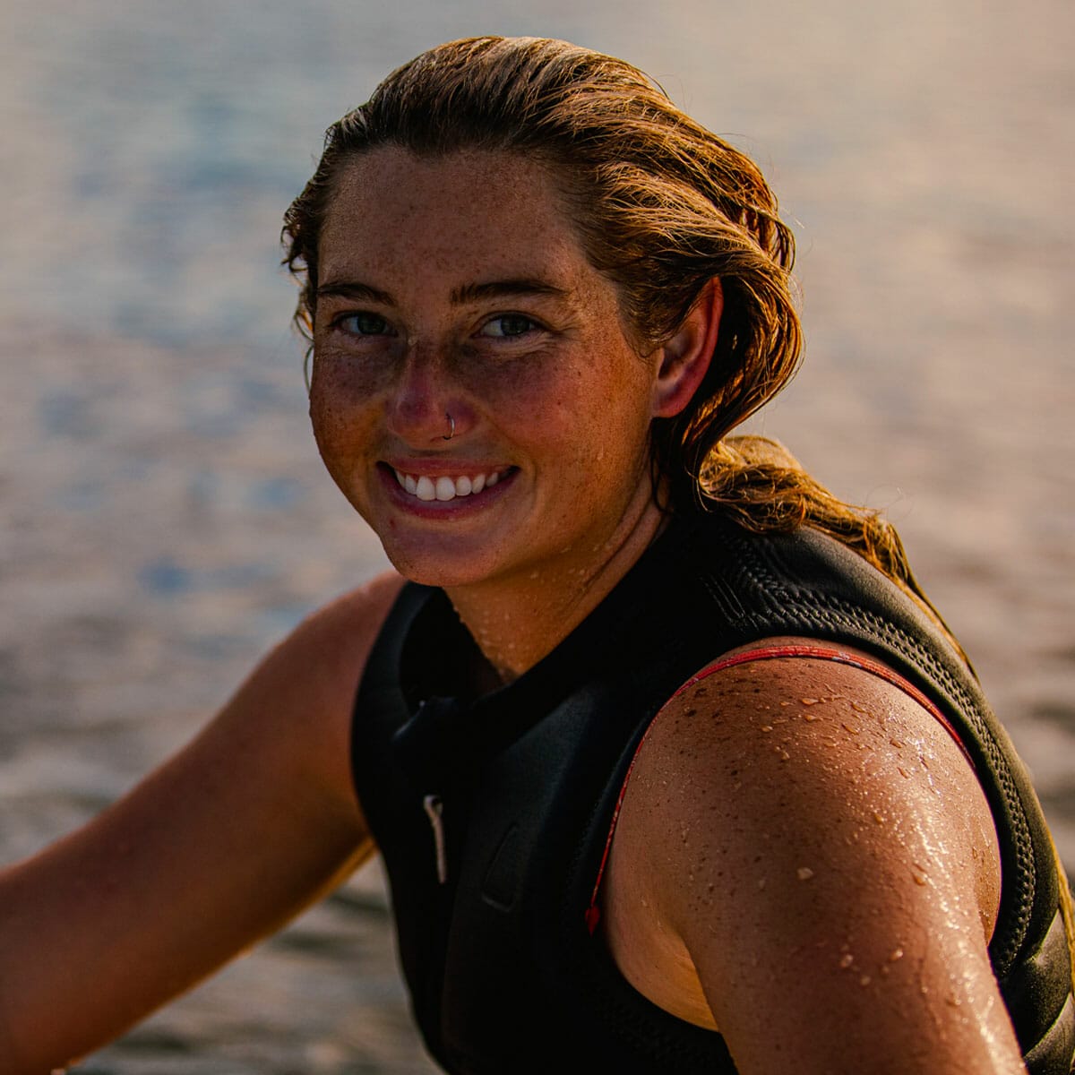 A woman on a wakesurf board.