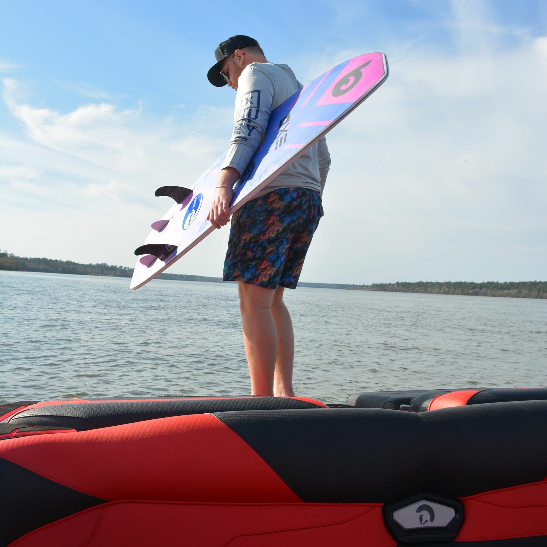 A man with a surfboard.