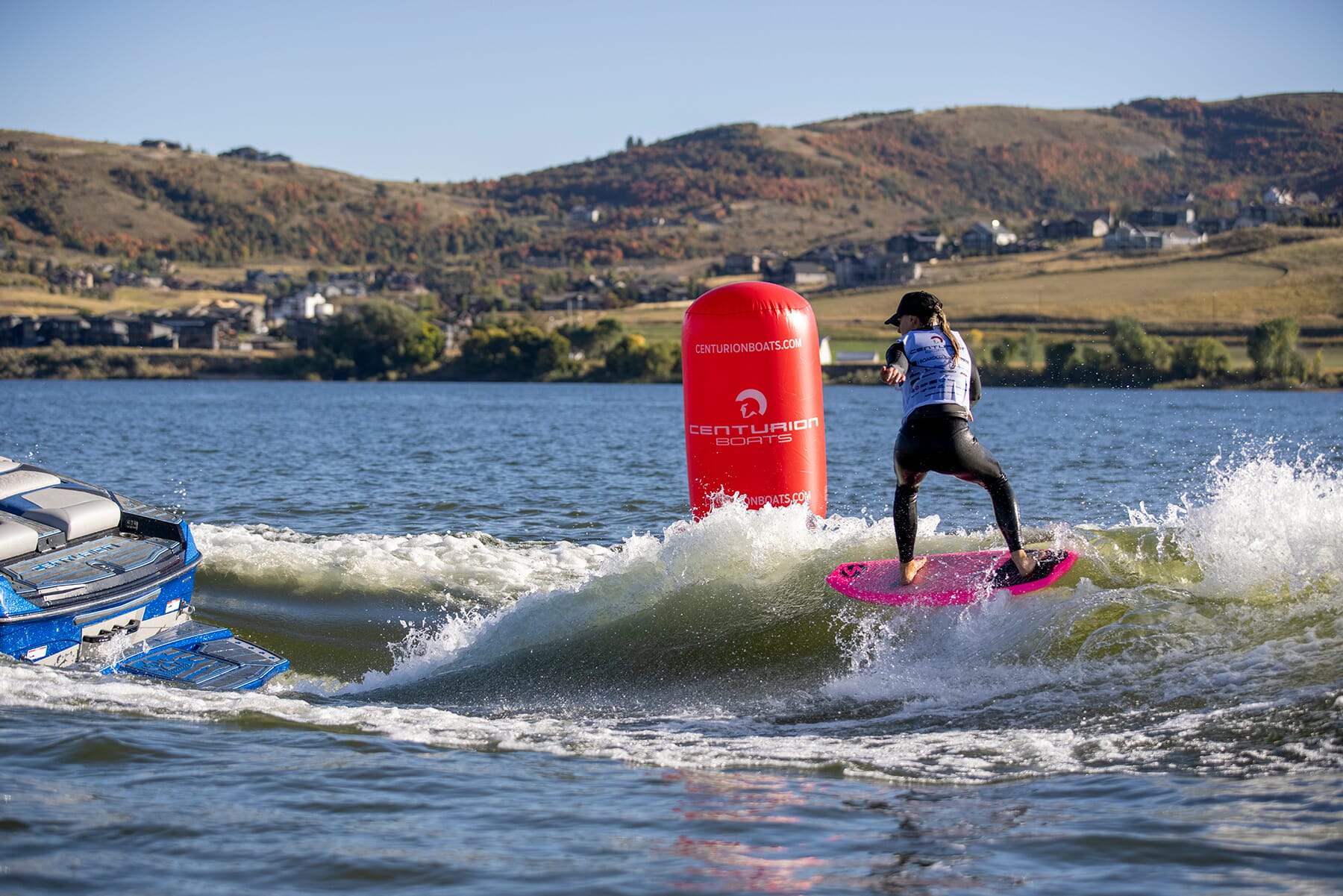 2024 WWSC Day 2 Recap: A man surfing a wave.