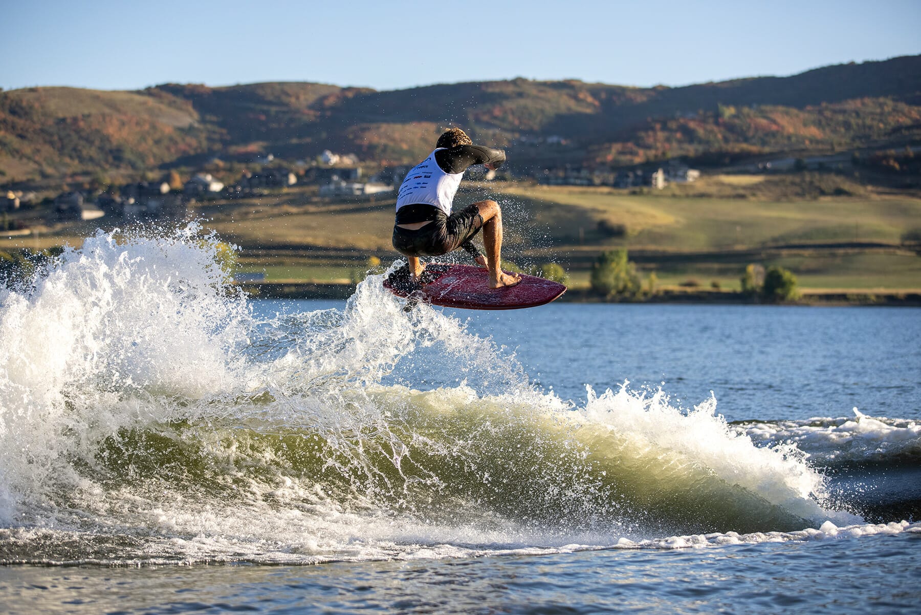 2024 WWSC Day 2 Recap: A surfer tackles a wave.