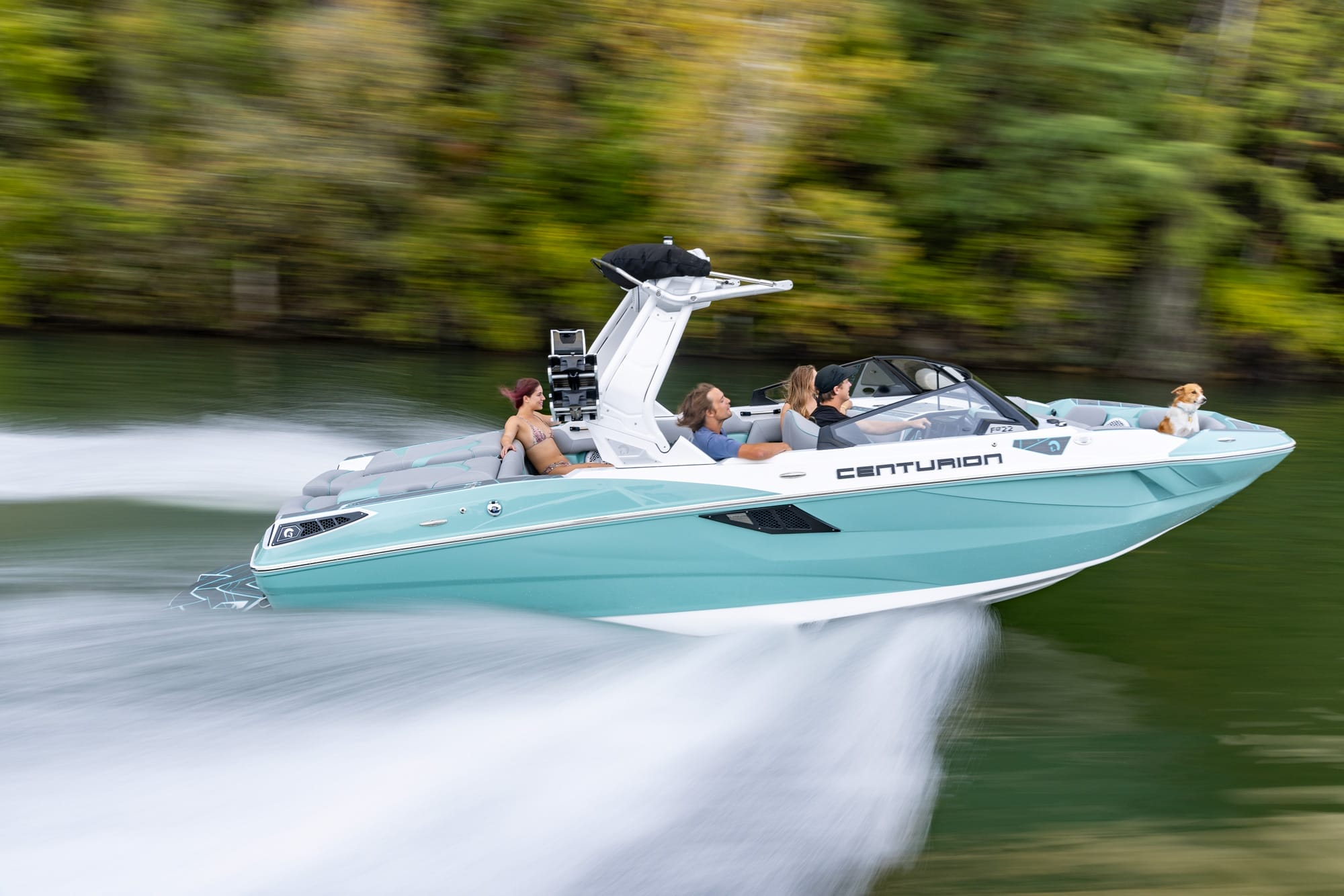 A group of people are riding a boat on the water.