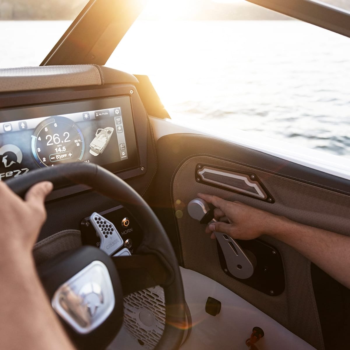 Close-up of a person's hands steering and operating the control panel on a boat, with speed displayed as 26.2. The boat is on water with sunlight in the background.