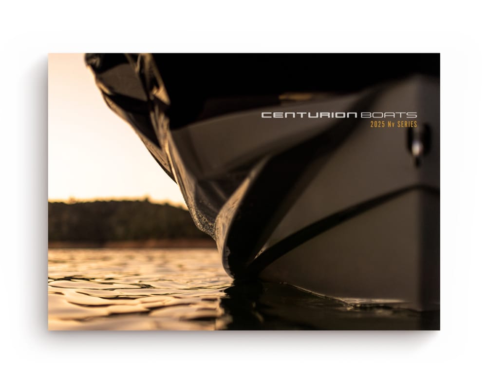 Close-up view of a boat's hull on water with text 